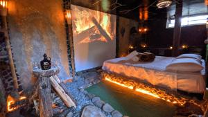 Postel nebo postele na pokoji v ubytování BioHotel Ecohouse
