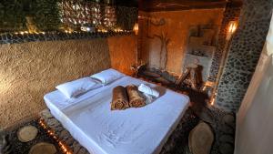 Letto o letti in una camera di BioHotel Ecohouse