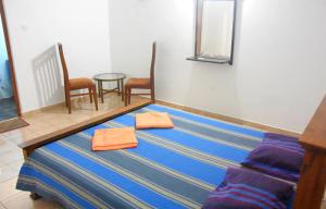 Postel nebo postele na pokoji v ubytování Maharagama Shehan Hotel