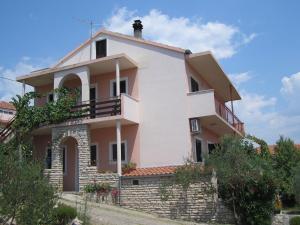 a villa with a view of the house at Apartments Ajka in Tisno
