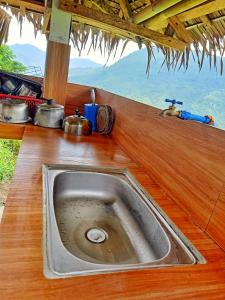 a sink in a kitchen with a counter top at MIRA AgroPark in Kuyambay