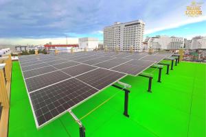 a row of solar panels on the roof of a building at The Grand Lodge Pattaya in Pattaya Central