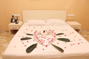 Postel nebo postele na pokoji v ubytování Nilawin Hotels & Resorts