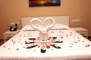 Postel nebo postele na pokoji v ubytování Nilawin Hotels & Resorts