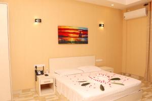 Postel nebo postele na pokoji v ubytování Nilawin Hotels & Resorts
