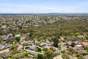 an aerial view of a suburb with houses at Boutique Stays - That 70s House in Mount Waverley
