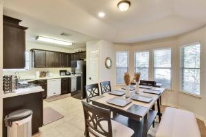 a kitchen and dining room with a table and chairs at Charming and Comfort 3BR/2BA Retreat in Kyle in Kyle