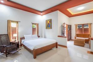 Nirmala Guest House Surf Keramas客房内的一张或多张床位