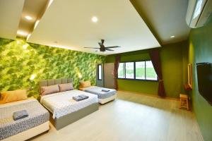 Gallery image of คาสโซพูลวิลล่า in Ban Hup Kaphong