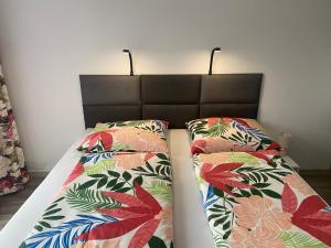 Posteľ alebo postele v izbe v ubytovaní 1 Tyskie Apartamenty z ogródkiem
