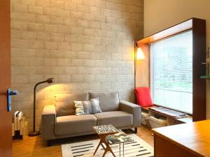 Ein Sitzbereich in der Unterkunft Industriële WOW! Private studio 35m2