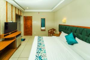Tempat tidur dalam kamar di Sukha Retreats