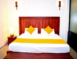 En eller flere senge i et værelse på City Hostel Colombo Airport