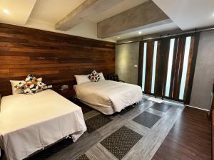 Uma cama ou camas num quarto em MZ 1090 B&B