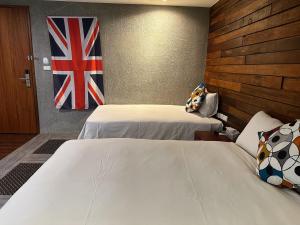 Uma cama ou camas num quarto em MZ 1090 B&B