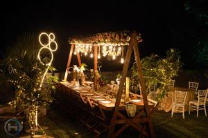 a table set up for a party at night at Holiday Island in Kollam, Nearby Varkala in Kollam