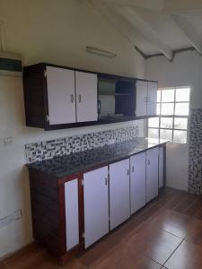 Kuchyň nebo kuchyňský kout v ubytování Hopeful + 4 fotografie