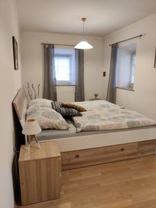 Postel nebo postele na pokoji v ubytování Ferienhaus Am Bach