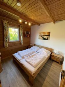 Postel nebo postele na pokoji v ubytování Blockhaus Windrose
