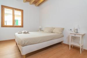 Postel nebo postele na pokoji v ubytování Can Serral