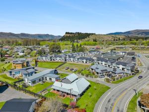 an aerial view of a suburb with houses at It's Easy! Space and comfort in Wanaka