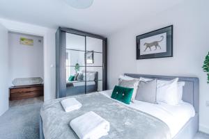 Ένα ή περισσότερα κρεβάτια σε δωμάτιο στο Stylish 2 bed Apartment in Central Manchester