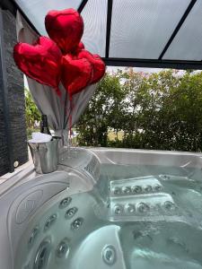 Billede fra billedgalleriet på TOPAZE Nuitée Romantique avec Jacuzzi i Moyvillers