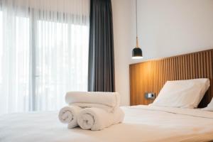 Vira Suites Hotel客房内的一张或多张床位