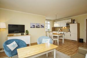 Küche/Küchenzeile in der Unterkunft mit Meerblick und Balkon, gratis Nutzung vom AHOI Erlebnisbad und Sauna in Sellin - Meeresblick FeWo 38