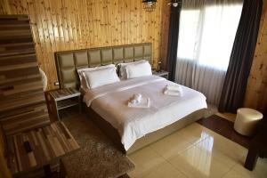 Postel nebo postele na pokoji v ubytování Buna Park Hotel + 37 fotografií