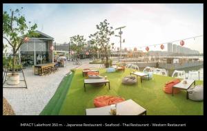 a rendering of a park with benches and tables at 55th AREA in Nonthaburi