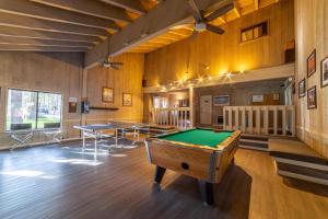 a billiard room with a pool table in it at #525 Walk to Golf Course, Midtown, Stunning Condo in Mammoth Lakes