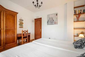 Łóżko lub łóżka w pokoju w obiekcie Casa rural Cuchia con vistas