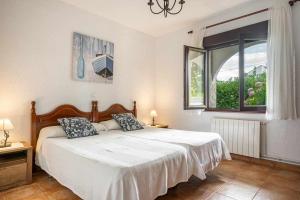 Łóżko lub łóżka w pokoju w obiekcie Casa rural Cuchia con vistas