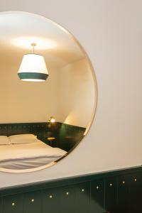 Postel nebo postele na pokoji v ubytování Hotel Ghalà