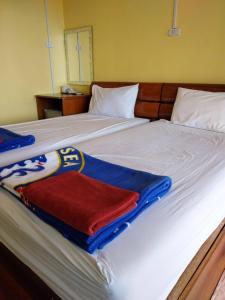 Cama ou camas em um quarto em Phi Phi Sand Sea View Resort