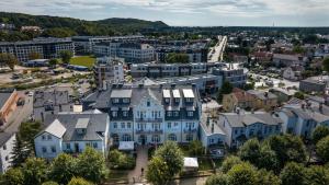 an aerial view of a city with houses at Rewita Międzyzdroje - Grunwald in Międzyzdroje