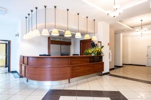 a lobby of a hospital with a reception desk at Rewita Międzyzdroje - Grunwald in Międzyzdroje