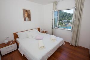 Ένα ή περισσότερα κρεβάτια σε δωμάτιο στο Apartment Vista 2