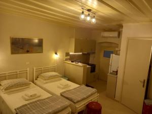 Postel nebo postele na pokoji v ubytování Studio CASINELLA