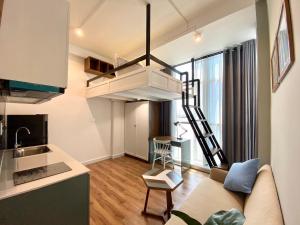 a small apartment with a kitchen and a living room at 8 minutes walking to Nguyen Hue, Fast Wifi, check-in 24/7 in Ho Chi Minh City