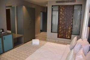 Postel nebo postele na pokoji v ubytování NT Hotels and Resorts Akridha