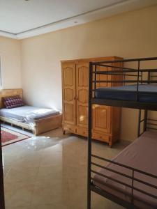 Letto o letti in una camera di Apartment in Larache Marokko