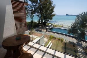 Bassein majutusasutuses Luxury beachfront duplex, Coin de Mire view / 3Bed või selle lähedal