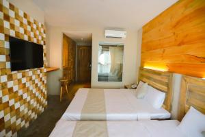 Gambar di galeri bagi Rustic Hotel Quy Nhon Powered by ASTON di Quy Nhon
