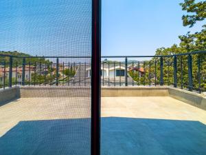 a view from a balcony with a view of the ocean at CAPELLA VİLLAS in Fethiye