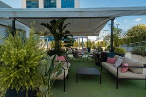 Posedenie v ubytovaní Hilton Garden Inn Sevilla