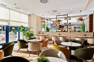 Posedenie v ubytovaní Hilton Garden Inn Sevilla