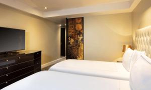 Cama ou camas em um quarto em Park Plaza London Riverbank