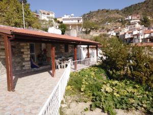 a house on a hill with a balcony at Traditional house in pelendri in Limassol